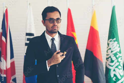 Asian businessman standing ...