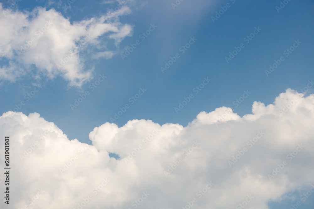 Fototapeta premium Bright blue sky with white clouds for background or wallpapers