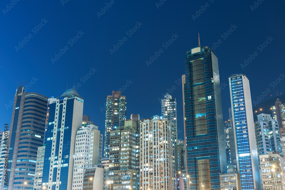 Naklejka premium high rise building and skyline of Hong Kong city at night