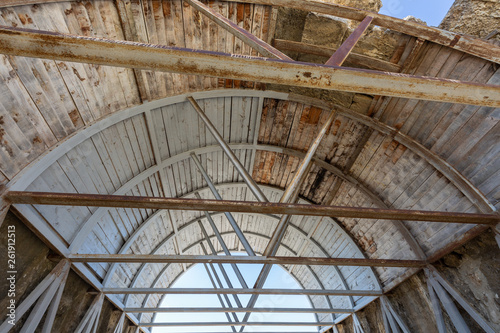 Wooden construction under the bridge