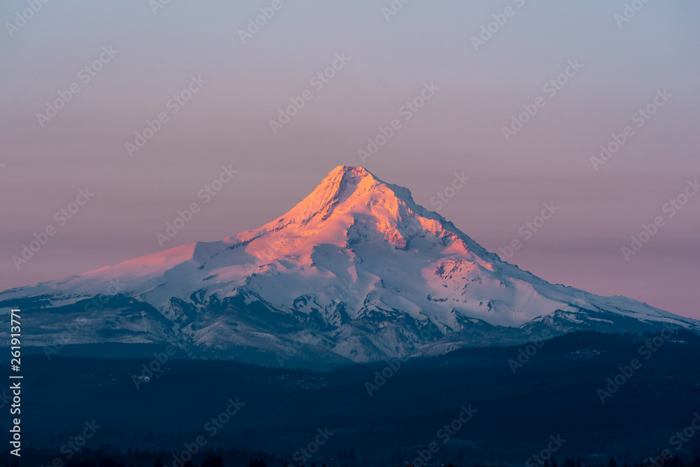 Sunrise on Mt. Hood, Oregon - morning light on the snow-covered stratovolcano 50 miles east of Portland, Oregon