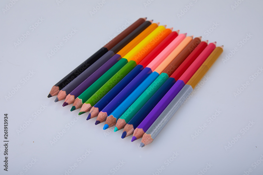 Set of double colored pencils on white background. Colored pencil, two sided.