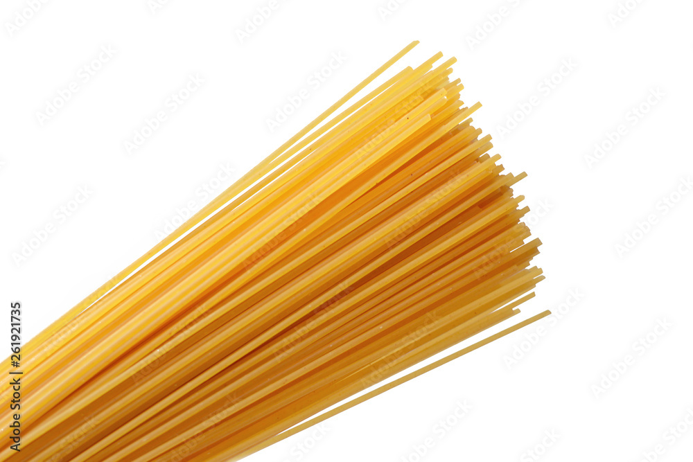 Uncooked yellow wheat spaghetti noodles isolated on white background Uncooked yellow wheat spaghetti noodles isolated on white background