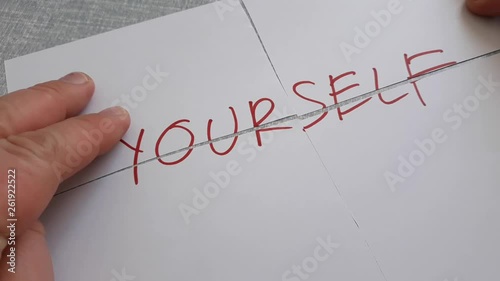 pull yourself together, bring your feelings under control and start acting normally; stop feeling sorry and start feeling confident paper sheet with word yourself pushing pulling in one piece