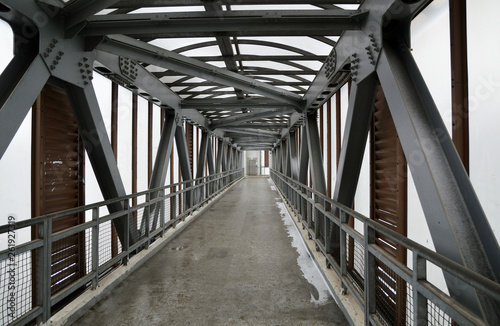 Fototapeta Naklejka Na Ścianę i Meble -  Empty footbridge (pedestrian crossing) in the afternoon in Moscow