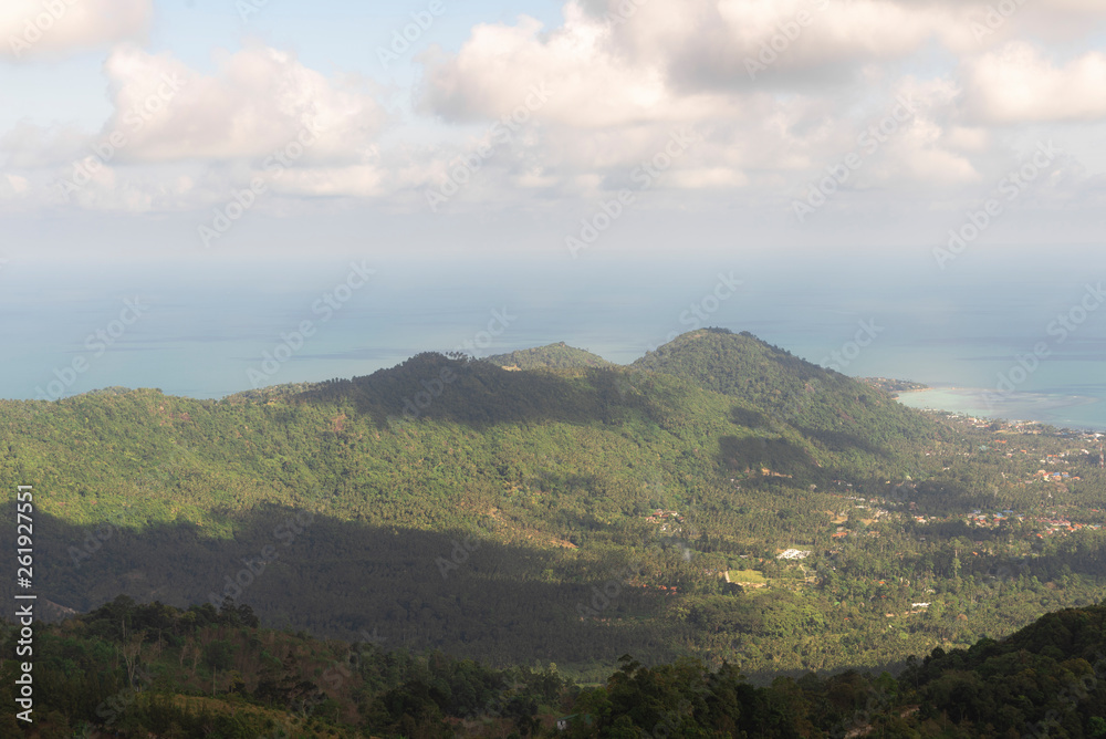 View of a nearby tropical jungle from high above the tree level, Koh Samui, Thailand View of a nearby tropical jungle from high above the tree level, Koh Samui, Thailand