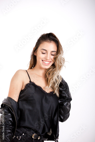 Beauty girl in Black leather jacket studio shoot