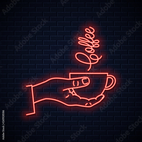 Hand hold coffee neon sign. Male coffee cup