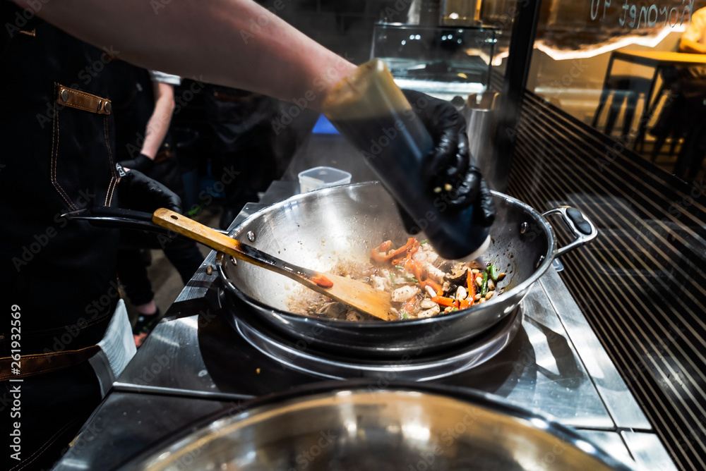 chef making wok box chef making wok box