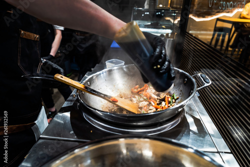 chef making wok box
