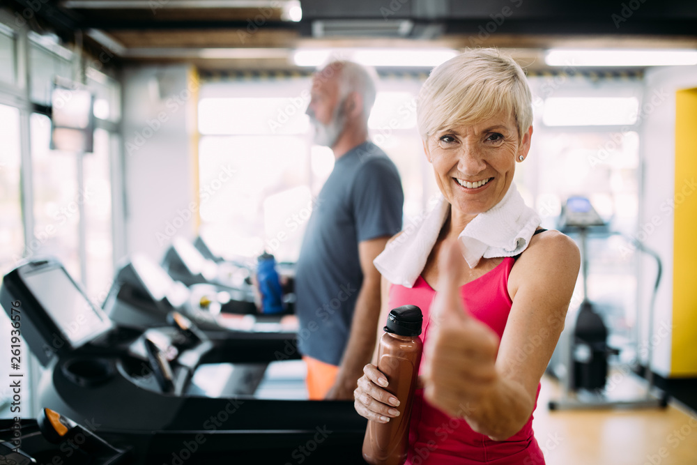 Picture of senior people running on treadmill in gym Picture of senior people running on treadmill in gym