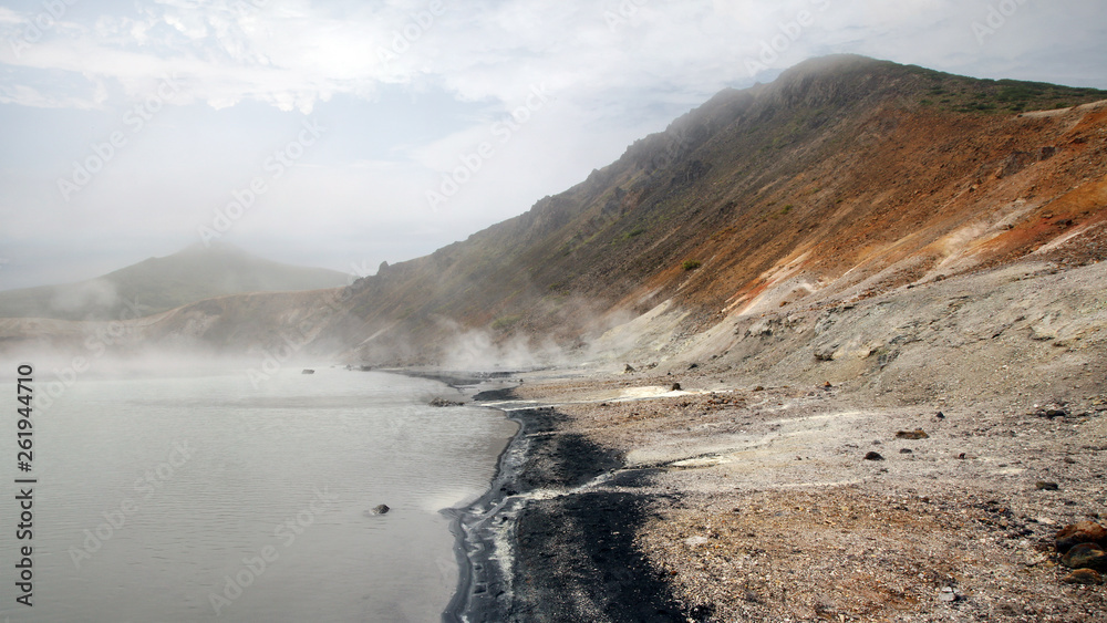 Panorama of the boiling lake in caldera of Golovnina volcano, Kunashir island, Russia Panorama of the boiling lake in caldera of Golovnina volcano, Kunashir island, Russia