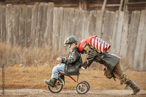 Children play in the rider and the rocketman