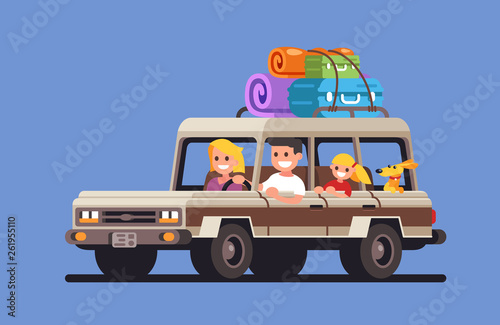 Young family with a child and a dog go on a trip by car	