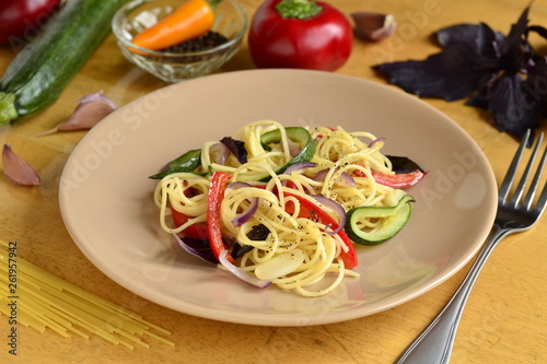 Pasta / spaghetti / with zucchini, sweet pepper and spices