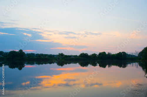 sunset over the lake © Oksana