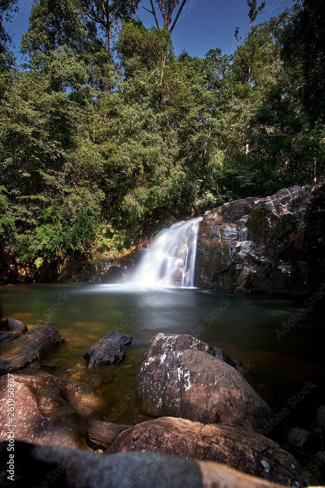 Obraz premium Waterfall Hidden in Paradise of Tropical Jungle