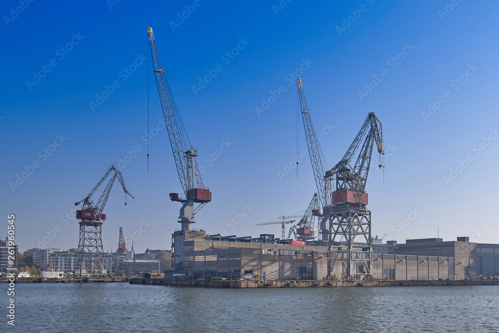View from the pier to the cargo seaport on a sunny day