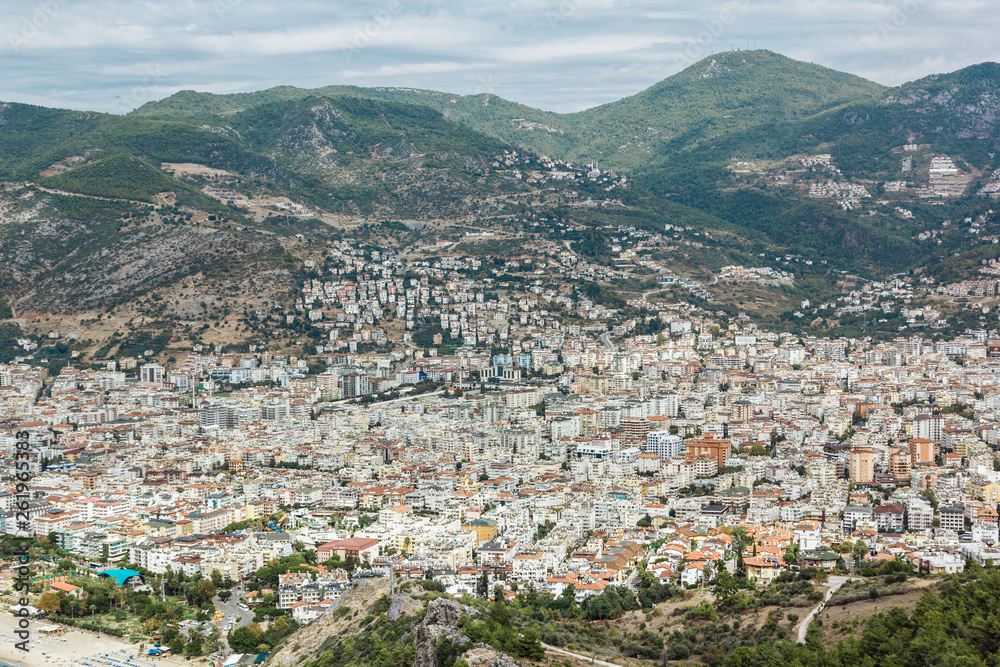 city with mountains in the background. Turkey, Alanya. Top view. Vertical