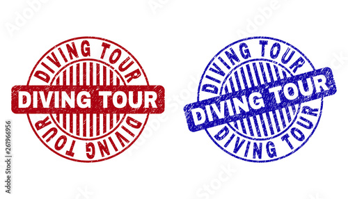 Grunge DIVING TOUR round stamp seals isolated on a white background. Round seals with grunge texture in red and blue colors. Vector rubber overlay of DIVING TOUR label inside circle form with stripes.