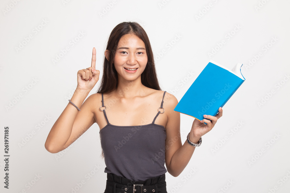 Young Asian woman with a book have an idea. Young Asian woman with a book have an idea.