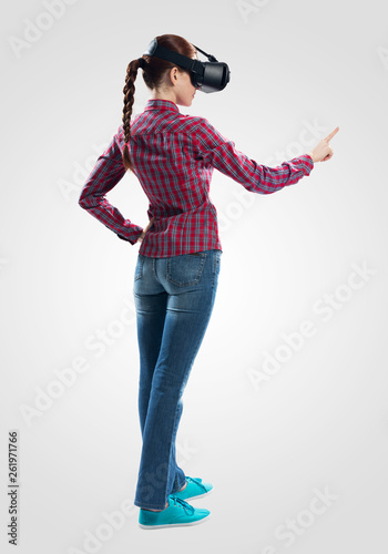 Beautiful girl using virtual reality glasses