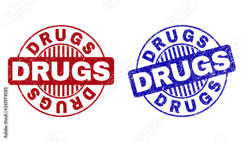 Grunge DRUGS round stamp seals isolated on a white background. Round seals with grunge texture in red and blue colors. Vector rubber imitation of DRUGS tag inside circle form with stripes.