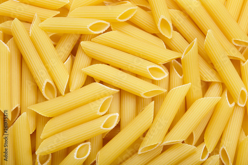 Pasta penne texture background.