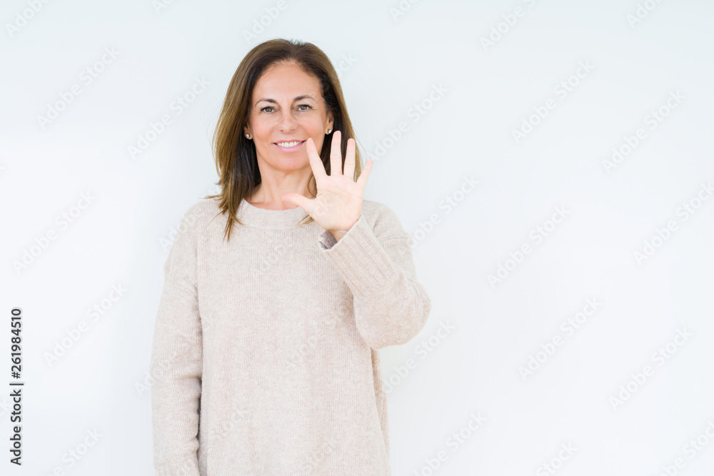 Beautiful middle age woman over isolated background showing and pointing up with fingers number five while smiling confident and happy. Beautiful middle age woman over isolated background showing and pointing up with fingers number five while smiling confident and happy.