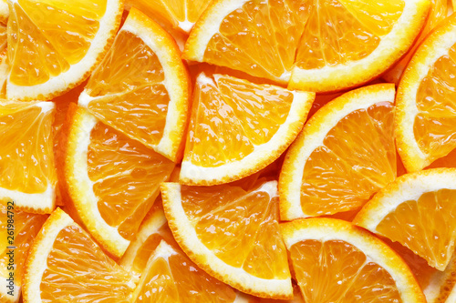 juicy orange slices as a bright background