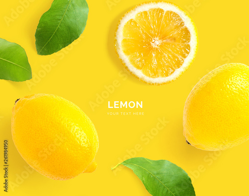 Creative layout made of lemon. Flat lay. Food concept. Macro concept. Yellow background.