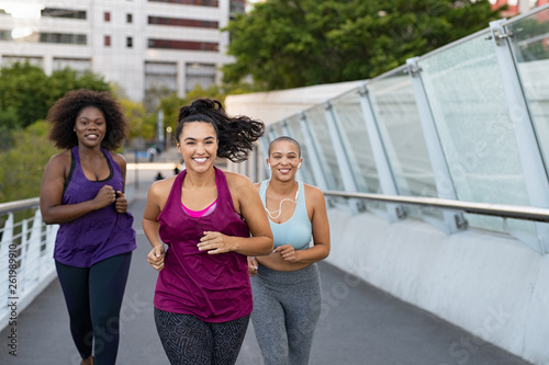 Group of natural women jogging