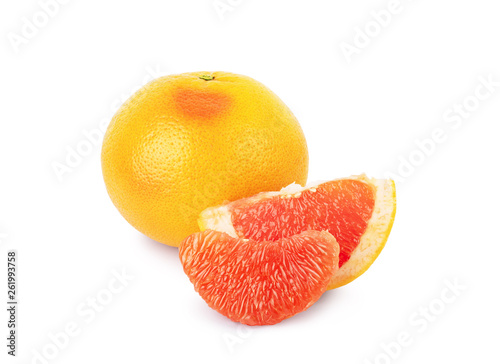 Ripe grapefruit in section on a white background