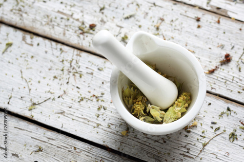 Fotografie Herbery, dried green lebanese sage in a mortar