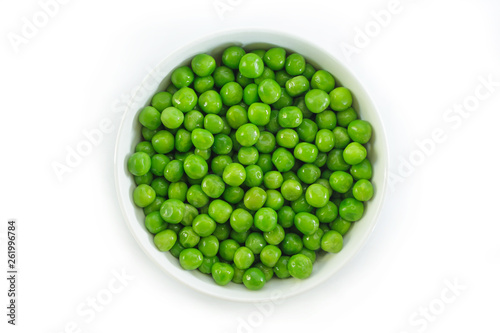 green peas on white bowl on white background.