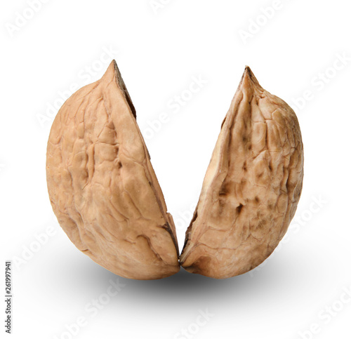 Two halves of chopped walnut. White isolated background. Close-up. Macro.