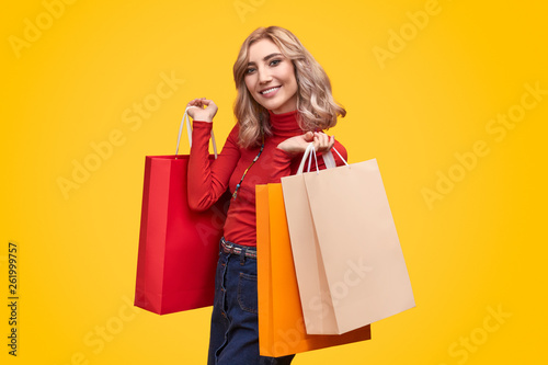 Smiling lady with shopping bags