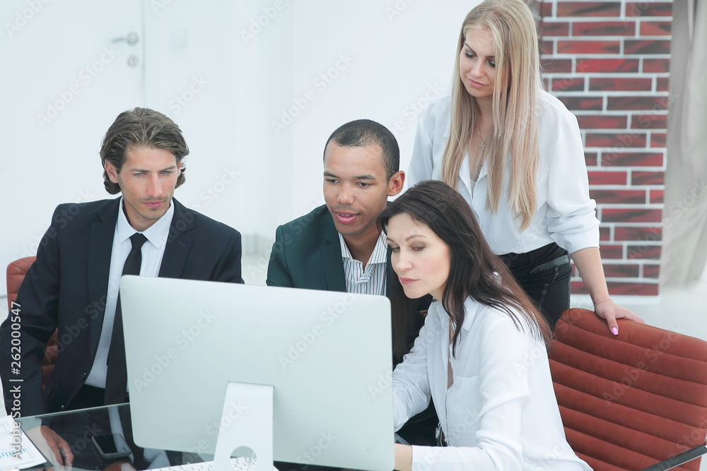 business people discussing financial information,sitting at his Desk