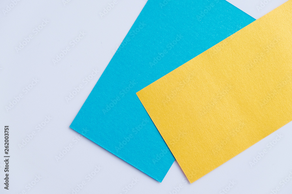 Mix of blue, yellow colors of design paper. Mix of blue, yellow colors of design paper.