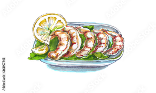 Grilled shrimps or prawns on a plate served with lemon