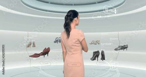 Virtual Reality Shop Online shopping concept. Woman operates HUD holographic user interface with products. Girl choosing shoes in internet web VR store.