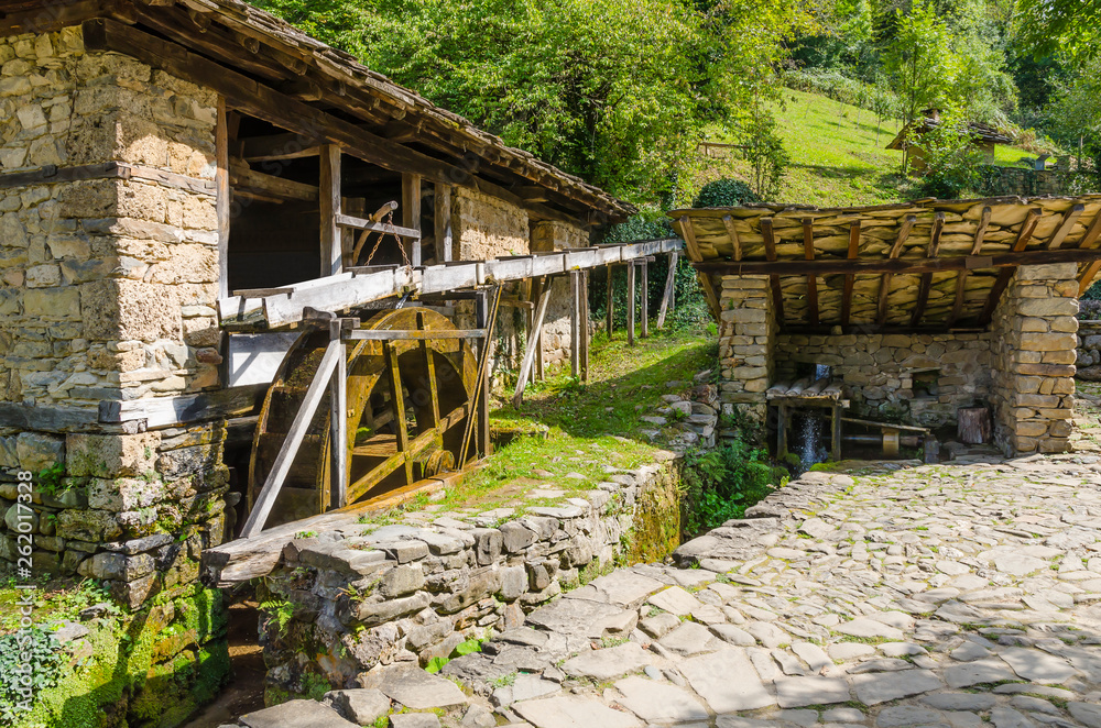 The water-powered fulling mill in the Architectural And Ethnographic Complex Etar - at open-air museum near the city of Gabrovo The water-powered fulling mill in the Architectural And Ethnographic Complex Etar - at open-air museum near the city of Gabrovo