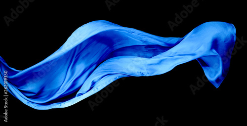 Canvas Print Smooth elegant blue transparent cloth isolated on black background