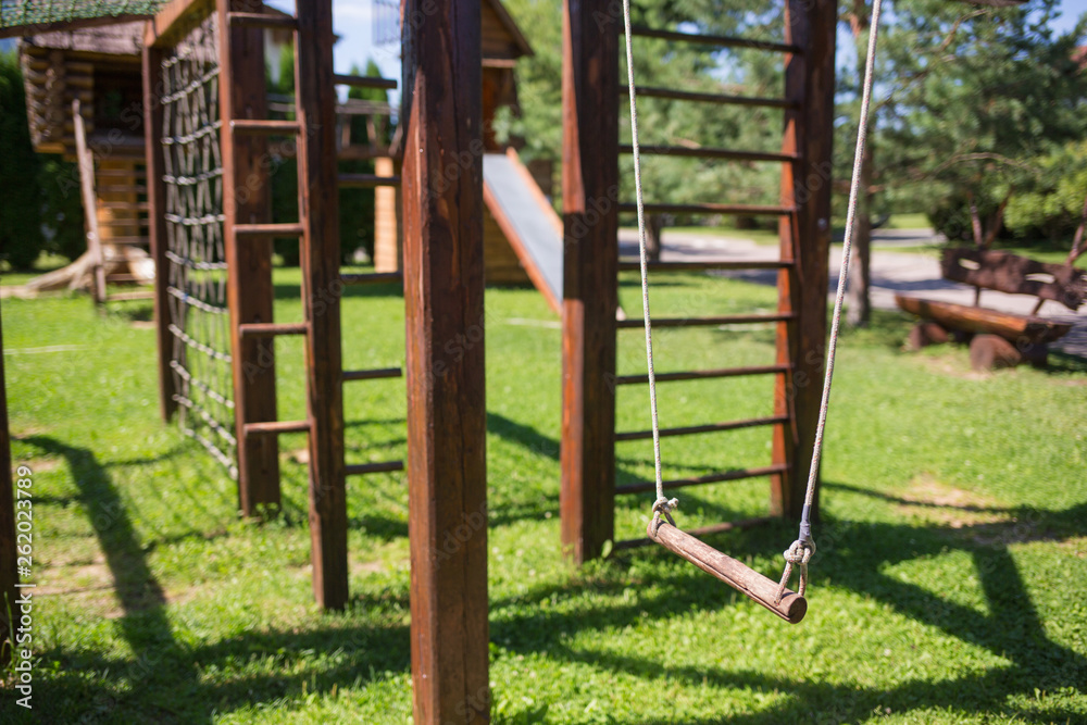 wooden Playground in summer on a Sunny day wooden Playground in summer on a Sunny day