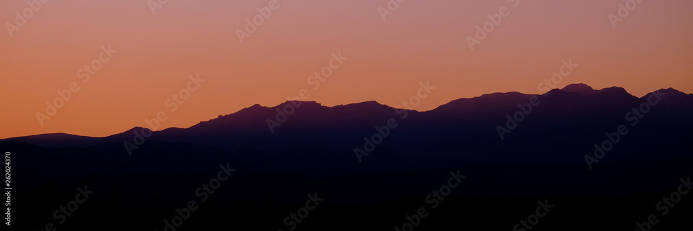 Skyline during the sunset of the Mountains Alps from Vicenza, April 2019