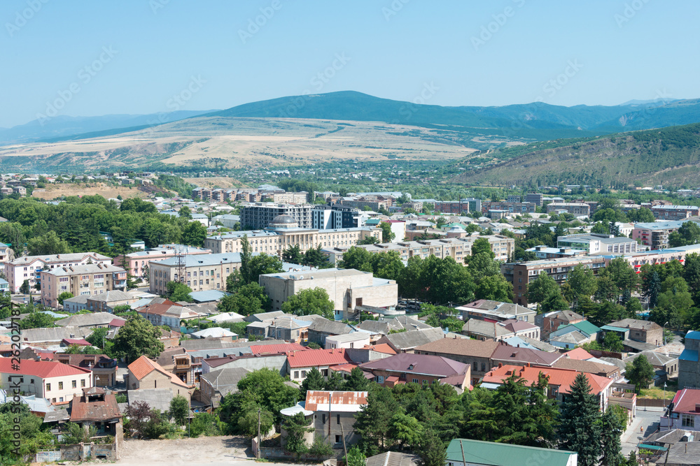 Gori, Georgia - Jul 04 2018: Gori City view from Ruins of Gori fortress in Gori, Shida Kartli, Georgia.