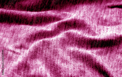 Textile texture with blur effect in pink color.