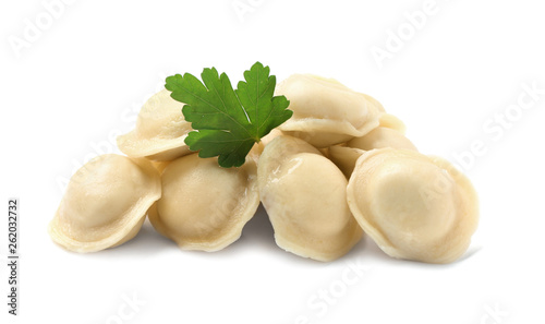 Boiled dumplings with parsley on white background