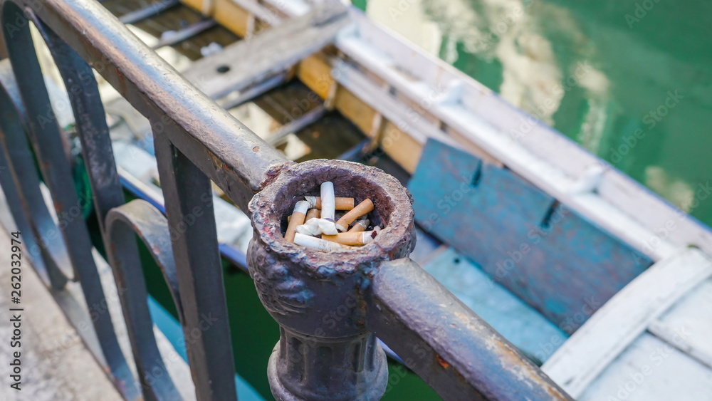 14824_A_cigarette_holder_on_the_edge_of_the_railings_in_Venice_Italy.jpg