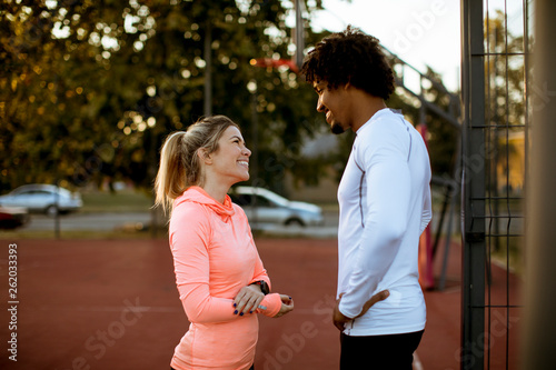 Multiethnic couple doing sp...